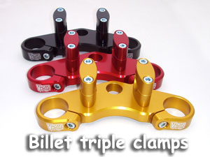 Triple clamps with fat bar mounts